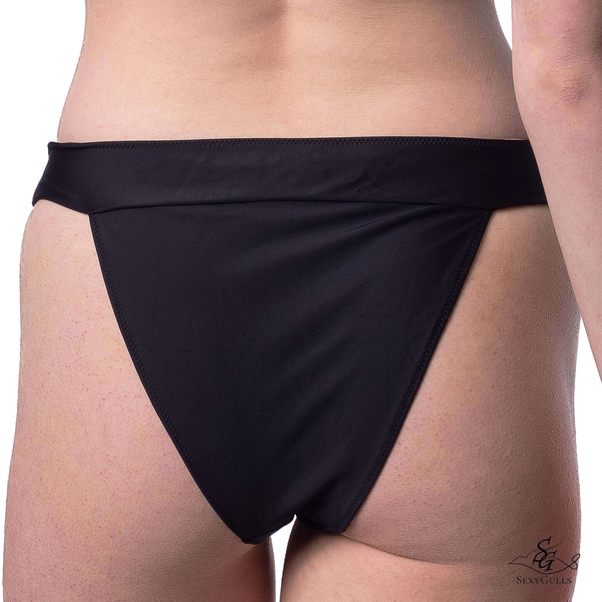 Zoomed in back view of black bikini bottom featuring medium bum coverage.