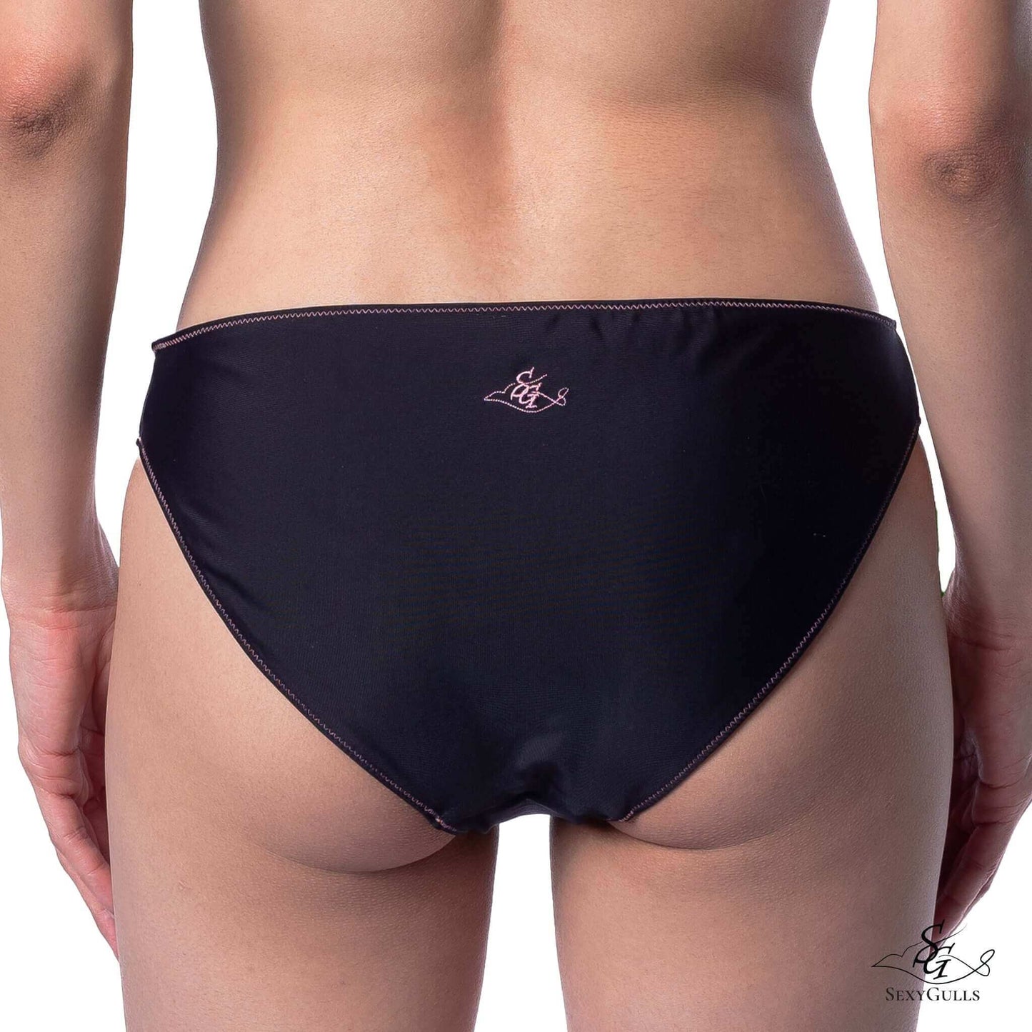 Back view of woman black full bum coverage bikini bottom with pink embroidered logo. 