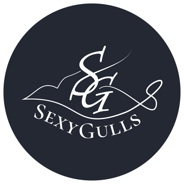 white SexyGulls logo with black background in circle