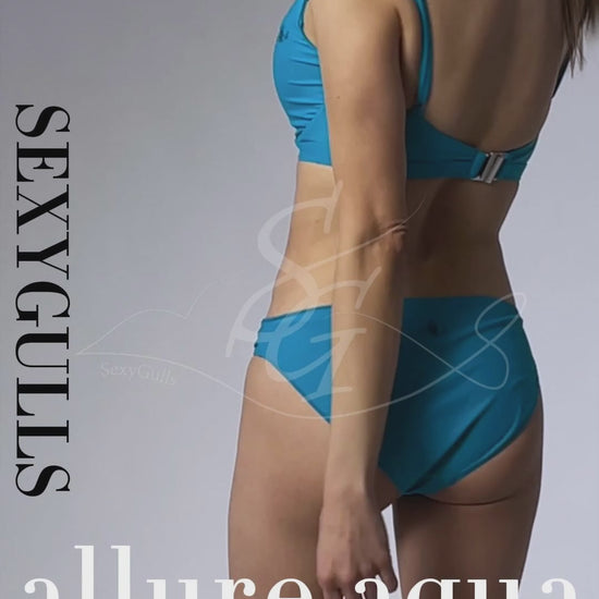 video of model wearing blue Allure Aqua bikini in studio