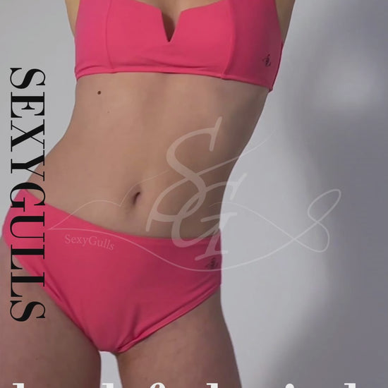 video of model wearing lushful pink bikini in studio